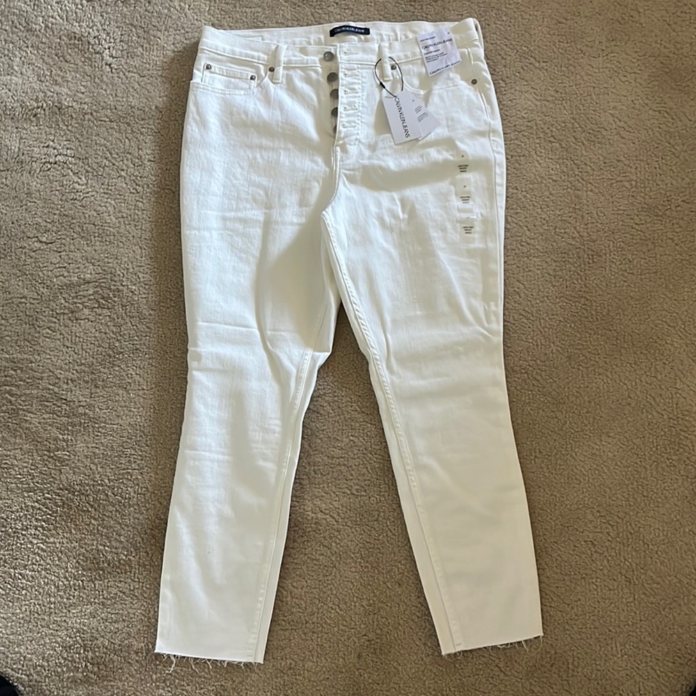 Brand new Calvin Klein white jeans. Tags still on them. Size 32.